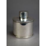 GEORGE V SILVER TEA CADDY, oval and straight sided with gadroon edge to the top and bottom, plain