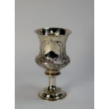 VICTORIAN EMBOSSED SILVER GOBLET BY GEORGE UNITE, of campana form with waisted stem and stepped