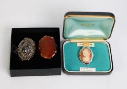 SILVER OVAL TARG BROOCH, of Victorian style, Birmingham 1947; large oval orange agate BROOCH and a