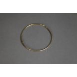 GOLD COLOURED METAL (unmarked) HOLLOW WIRE PATTERN BANGLE, 2.9gms