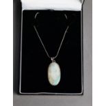 SILVER SNAKE CHAIN NECKLACE and large oval opal PENDANT, 1 1/2in x 7/8in (4 x 2.25cm), in case