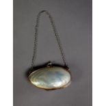 UNMARKED SILVER COLOURED METAL MOUNTED MOTHER OF PEARL SHELL PATTERN PURSE, of typical form with