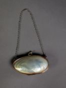 UNMARKED SILVER COLOURED METAL MOUNTED MOTHER OF PEARL SHELL PATTERN PURSE, of typical form with