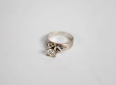 18ct WHITE MATT GOLD RING with broad flat shank with a round brilliant cut solitaire diamond in a