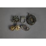 SILVER PENDANT with quartz back; a silver thistle BROOCH; a silver and marcasite flower BROOCH; a