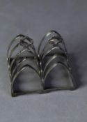 GEORGE VI PAIR OF SILVER SMALL FOUR DIVISION TOAST RACKS BY EDWARD VINER, each with arched divisions