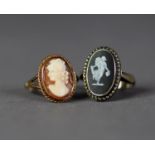 9ct GOLD RING collet set with an oval shell cameo carved with a female head, rope edge to the mount,