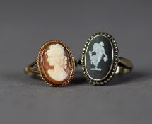 9ct GOLD RING collet set with an oval shell cameo carved with a female head, rope edge to the mount,