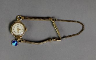 LADY?S AVIA SWISS 9ct GOLD WRISTWATCH, with 15 jewelled movement, circular white Arabic dial and the