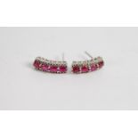 PAIR OF WHITE GOLD (unmarked) RUBY AND DIAMOND EARRINGS for pierced ears, each earring slightly