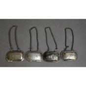 GEORGE VI, SET OF FOUR SILVER DECANTER LABELS, WHISKY, GIN, RUM and SHERRY, each of canted oblong