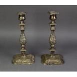 PAIR OF ELECTROPLATED TABLE CANDLESTICKS, each with ornate cast square baluster stem, urn shaped