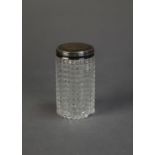VICTORIAN CUT GLASS CYLINDRICAL TOILET JAR WITH ENGRAVED SILVER PULL-OFF COVER, 3 ½? (8.9cm) high,