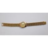 LADY'S VINTAGE 9ct GOLD CASE WRISTWATCH, with mechanical movement and rolled gold expanding bracelet