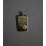 GOLD (unmarked) RECTANGULAR TABLET PENDANT, engraved with two hearts and set with a tiny diamond,
