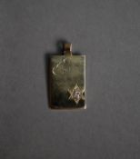 GOLD (unmarked) RECTANGULAR TABLET PENDANT, engraved with two hearts and set with a tiny diamond,