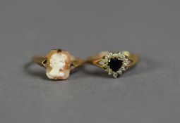 9ct GOLD CLUSTER RING set with a heart shaped sapphire with surround of tiny white stones, ring size