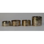 FOREIGN SILVER COLOURED METAL (830 standard) ENGRAVED BROAD NAPKIN RING, decorated with foliate