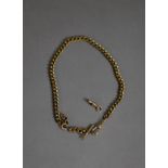 9ct GOLD WATCH CHAIN CLIP, 1.6gms and a GOLD PLATED CURB PATTERN WATCH CHAIN with clip and guard