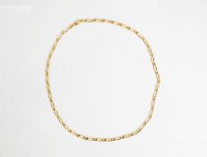 18ct GOLD CHAIN NECKLACE with long and short flattened curb links, 19 1/2in (49.5cm) long, 9.2gms