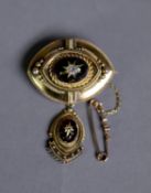 LATE VICTORIAN GOLD COLOUR METAL (unmarked) ELLIPTICAL LOCKET BROOCH, suspending a matching