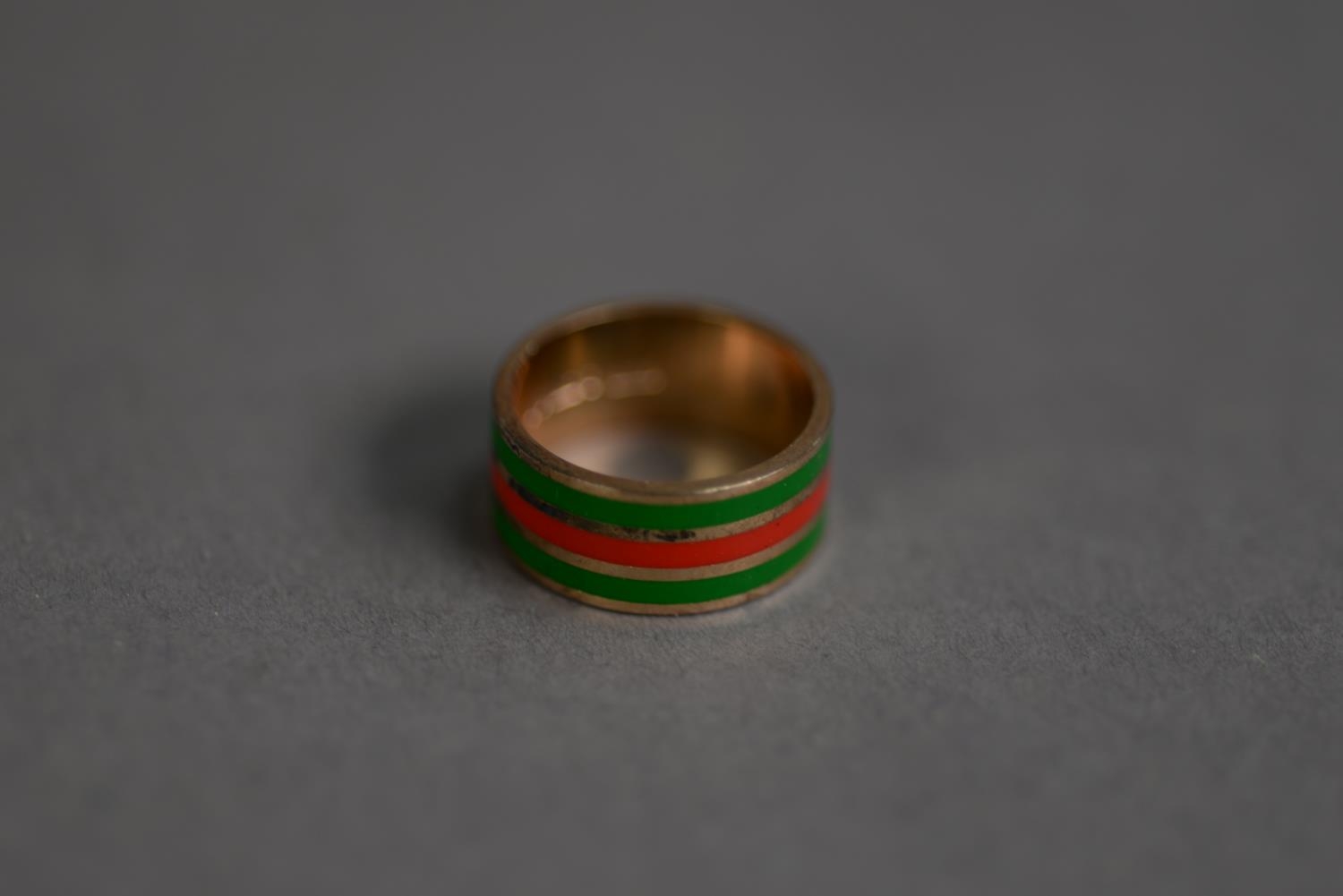 9ct GOLD BROAD BAND RING with red and green enamelled stripes, ring size J, 3.7gms