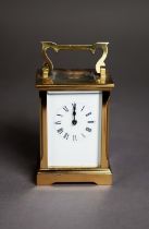ACG BRASS CARRIAGE CLOCK, with Roman dial and polished brass case with moulded corners, oblong top