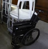 A 'NUMATIC' TROLLEY AND A FOLD-UP WHEEL CHAIR (2)
