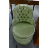 A GOLD BUTTON UPHOLSTERED DRUM SEATED BEDROOM EASY CHAIR