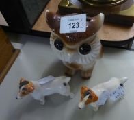 TWO BESWICK CHINA MODELS OF FOX HOUNDS AND A POTTERY OWL MONEYBOX (3)