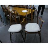 A SET OF EIGHT ELM HOOP BACK DINING CHAIRS, WITH PANEL SEATS, WITH LOOSE SQUAB CUSHIONS, INCLUDING 2