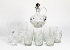 MODERN CUT GLASS SPIRIT DECANTER WITH HALLMARKED SILVER STOPPER, of compressed form with loop handle