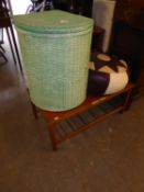 A GREEN LOOM CORNER LINEN RECEIVER; A BROWN AND CREAM LEATHER POUFFE AND AN OBLONG COFFEE TABLE WITH