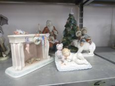 FIVE MODERN PIECES OF LLADRO PORCELAIN comprising; Santa Claus, a Fireplace with hanging