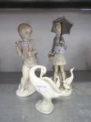 LLADRO PORCELAIN FIGURE, OF A GIRL WITH OPEN UMBRELLA AND BASKET, GOOSE AND GOSLINGS ROUND HER FEET,