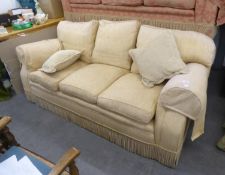 A THREE SEATER SETTEE
