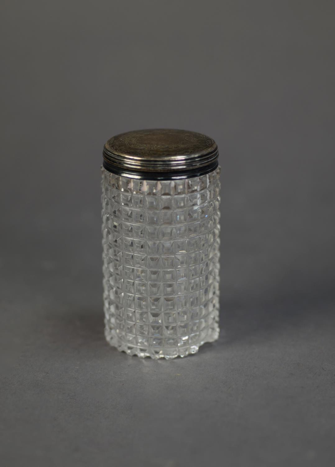 VICTORIAN CUT GLASS CYLINDRICAL TOILET JAR WITH ENGRAVED SILVER PULL-OFF COVER, 3 ½? (8.9cm) high,