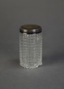 VICTORIAN CUT GLASS CYLINDRICAL TOILET JAR WITH ENGRAVED SILVER PULL-OFF COVER, 3 ½? (8.9cm) high,