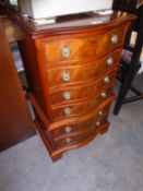 GEORGE III STYLE FIGURED MAHOGANY MINIATURE TALLBOY CHEST OF SIX LONG DRAWERS WITH SERPENTINE FRONT,