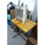 AN INVALID?S OVERBED TABLE AND A SMALL COLUMNAR ELECTRIC HEATER (2)