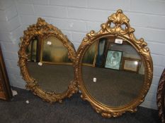 TWO OVAL WALL MIRRORS, IN ORNATE GILT FRAMES