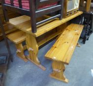 A PITCH PINE MODERN REFECTORY STYLE KITCHEN TABLE AND A PAIR OF BENCH SEATS ENSUITE (3)