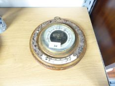 AN EDWARDIAN ANEROID BAROMETER