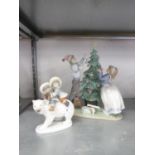 MODERN LLADRO PORCELAIN MODEL OF A BOY AND GIRL dressing a Christmas Tree, 13" (33cm) high, AND