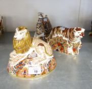 THREE MODERN ROYAL CROWN DERBY PORCELAIN JAPAN DECORATED ANIMAL MODELS comprising; 'Lion', 'Bengal