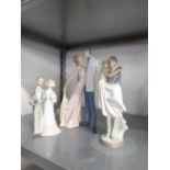 THREE LLADRO PORCELAIN GROUPS, MAN AND WOMAN IN EVENING DRESS EMBRACING, 12" (30.5cm) HIGH; MAN