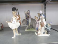 THREE PIECES OF MODERN LLADRO PORCELAIN comprising A MODEL of two Indian Children riding a baby