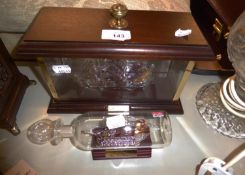 MAHOGANY AND GLAZED DISPLAY CASE CONTAINING A SPUN GLASS MODEL OF THE 'MAYFLOWER' GALLEON AND A