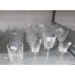 SET OF FOUR GEORGIAN STYLE CUT SHERRY GLASSES, WITH THUMB AND STUD CUT OGEE BOWLS, SHORT STEMS,