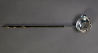 GEORGE III SILVER TODDY LADLE, with coin set bowl and twisted whalebone handle, the coin dated 1736,